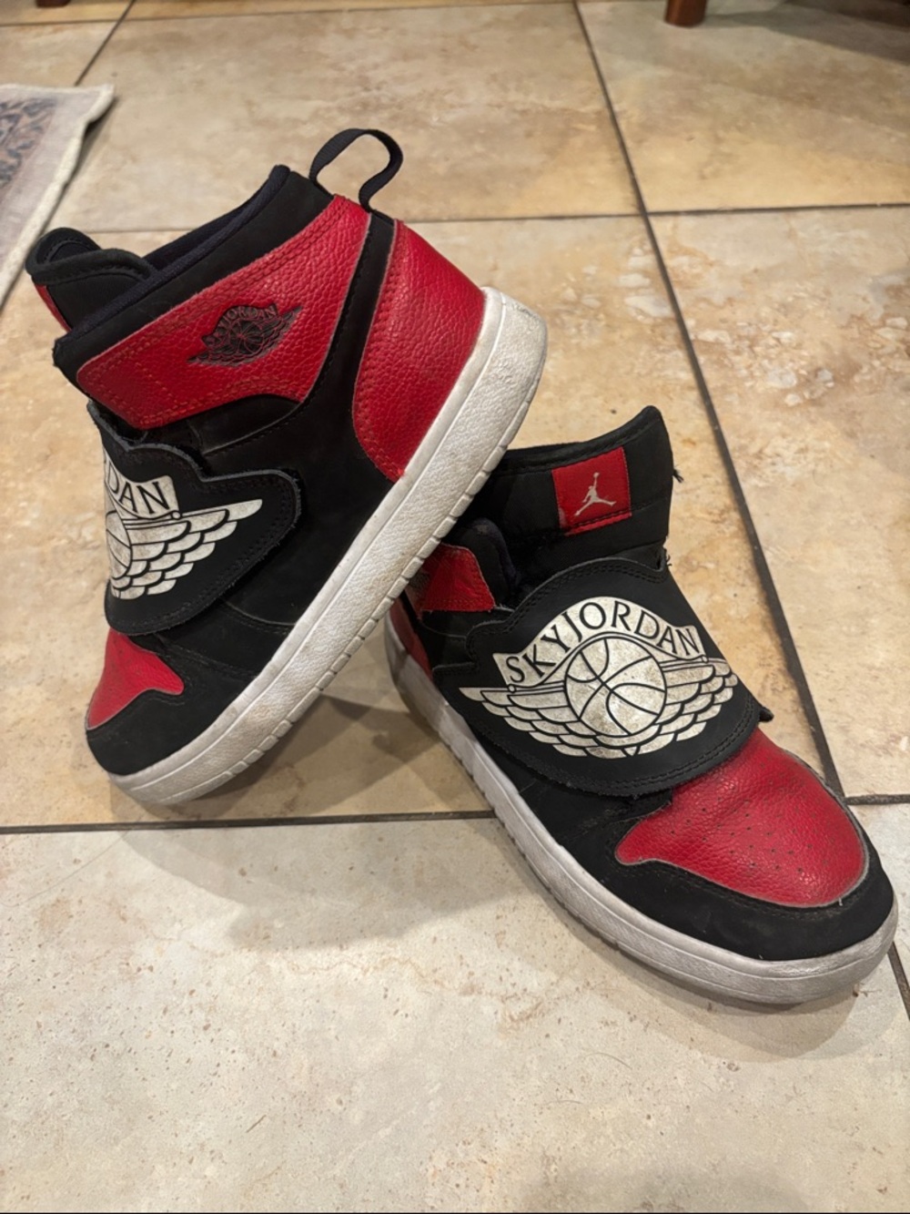 Jordan / Nike Kids Black and Red High-Top Basketball Sneakers